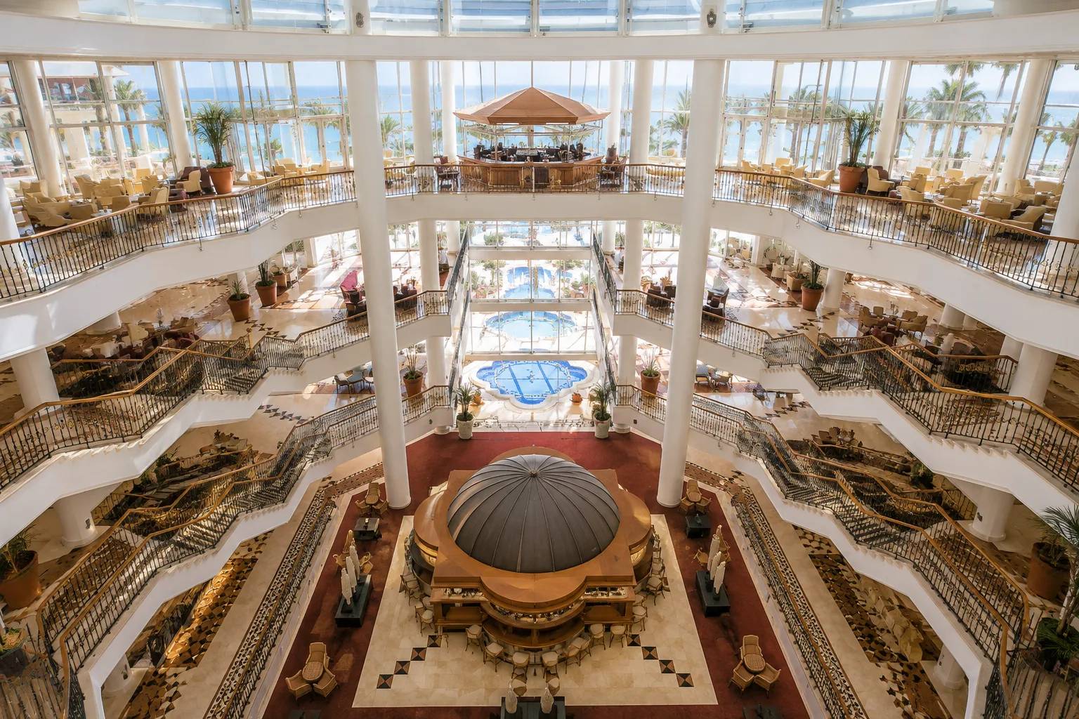 Luxury five-star hotel atrium with multi-story lobby
