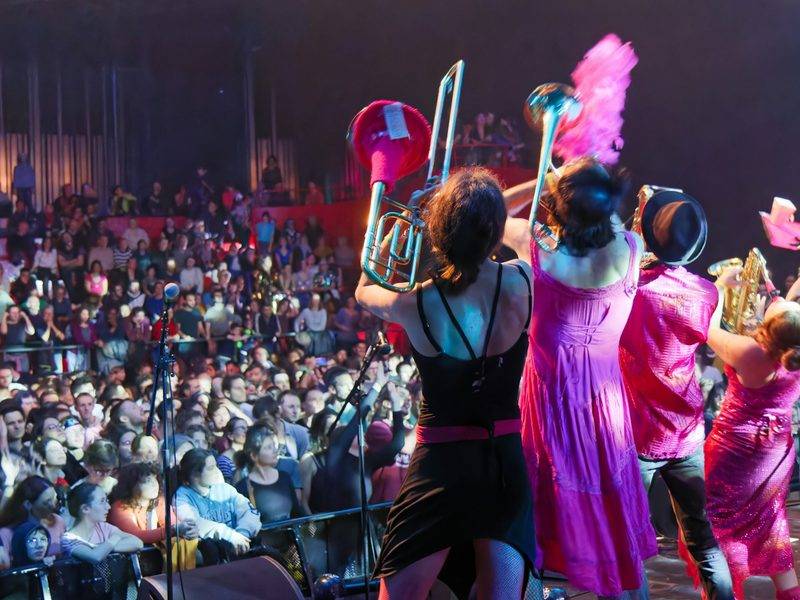 Show group performance under spotlights