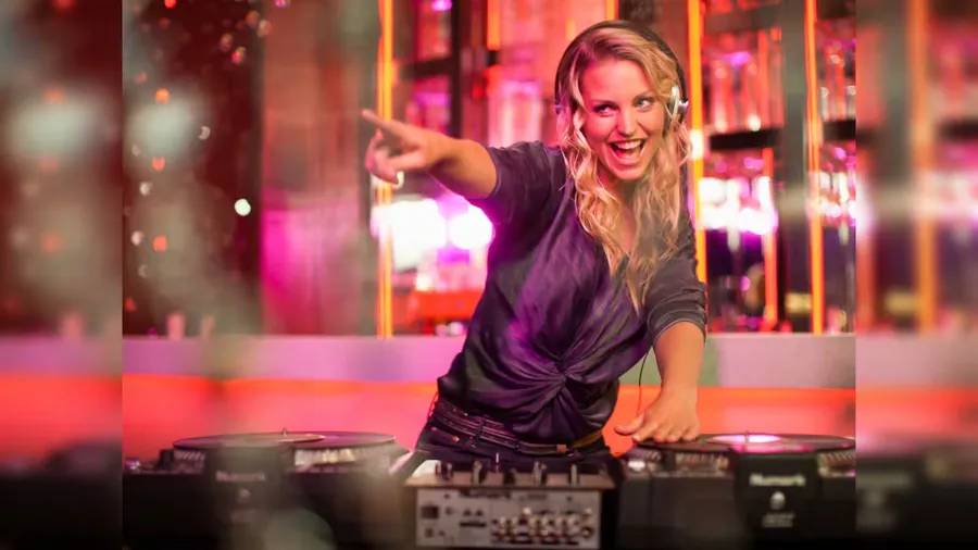 DJ hosting guests on the dance floor